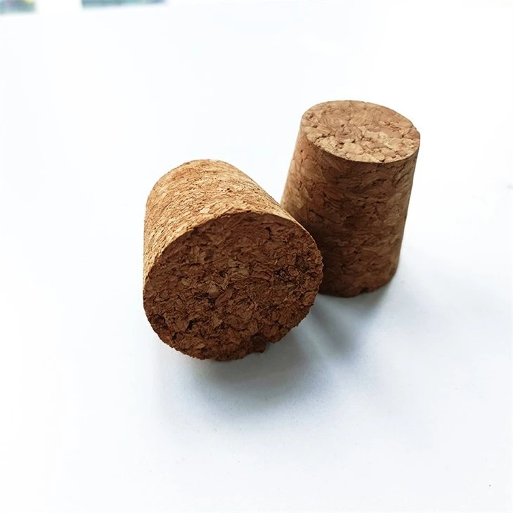 little glass bottles with cork stoppers